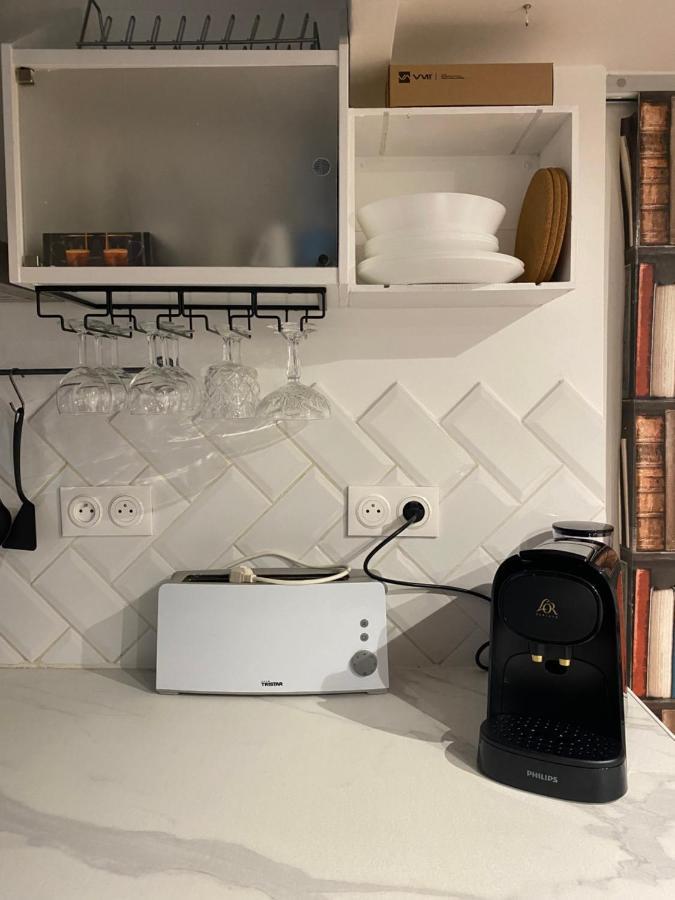 Appartamento Studio Au Coeur De Parigi Esterno foto